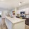 The Monaco at Waterford Lakes, Orlando, Florida kitchen with island and stainless steel appliances
