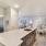 The Monaco at Waterford Lakes, Orlando, Florida kitchen with island and wood style flooring